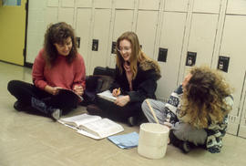 Photograph of hospitality students taking notes
