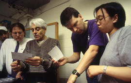 Photograph of faculty Ken Cummings in class with Industrial Design students