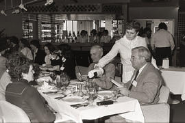 Photograph of guests seated at the table