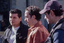 Photograph of three students in conversation