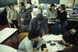 Photograph of students working on assignments