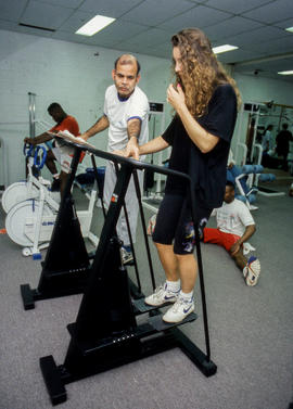 Photograph of people on fitness equipment in the Fitness Centre