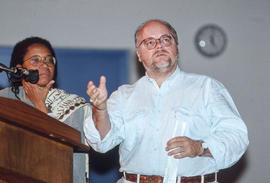 Photograph of Dionne Brand and Greg Gatenby at the podium