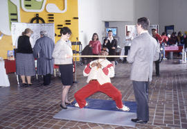 Photograph of a limbo dance contest in E Building