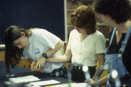 A photograph of Nursing students in a lab
