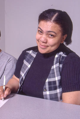 Photograph of a student taking notes