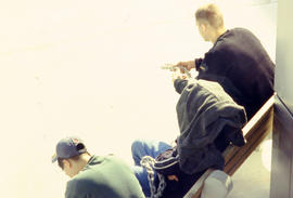 Photograph of students seated outdoors