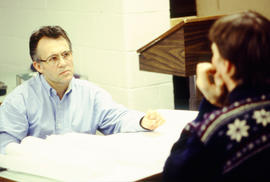 Photograph of student and instructor in the  Architectural program