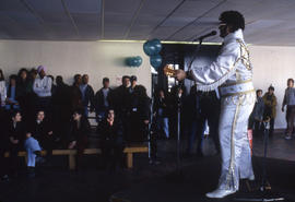 Photograph of Students Watching an Elvis Impersonator