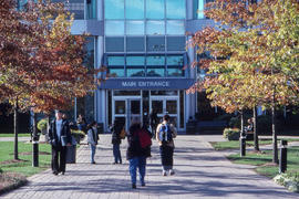 Photograph of students walking towards the main entrance at North