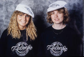 Photograph of Two Individual Wearing Humber College Leadership Clothing