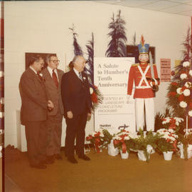 Photograph of Russ Geddes Presenting a "Salute to Humber's 10th Anniversary" to Robert ...