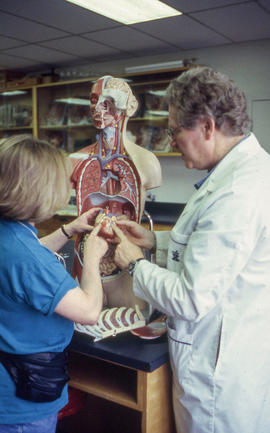 Photograph of faculty member Henry Ruschin and student