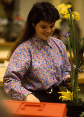 Photograph of a student from the retail floristry programme