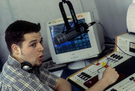 Photograph of student in Humber radio broadcasting studio