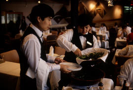 Photograph of Hospitality Students Serving Customers in the Humber Room