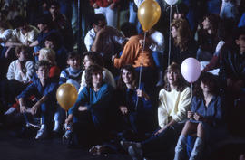 Photograph of students with balloons attending an event