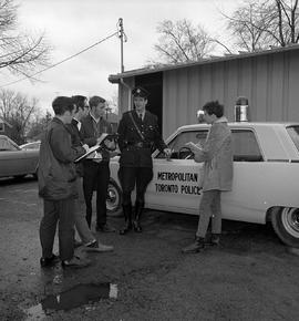 Photograph of students talking to Police Constable David Peever