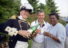 Photograph of Scott Hughes and Winsome Smith drinking some bubbly