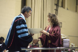 Photograph of a Student Receiving Her Certificate at Convocation