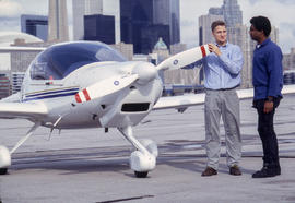 Photograph of an aviation instructor and student