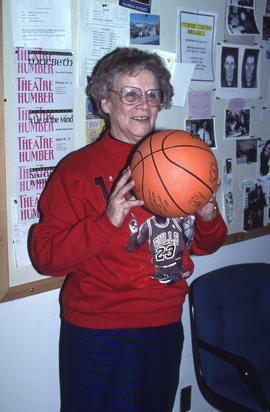 Photograph of Doris Tallon with a basketball