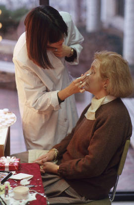 Photograph of a cosmetology student and a customer