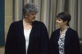 Photograph of Two Staff Members Attending Convocation
