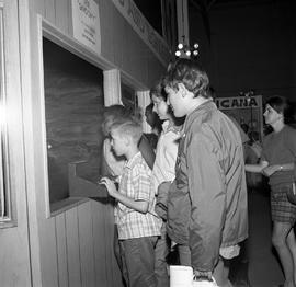 Photograph of People Visiting Humber's Booth in the Canadian National Exhibit