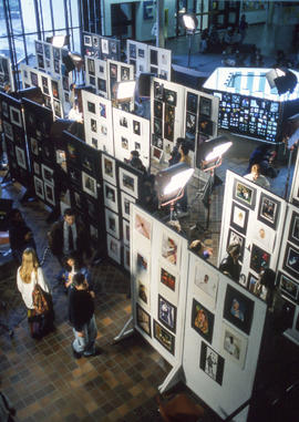 Photograph of students and staff at the annual photo art show
