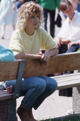Photograph of audience member watching a performance
