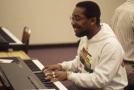 Photograph of a Student Using an Electronic Keyboard