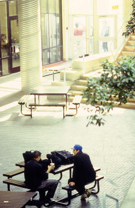A photograph of two students sitting at a table