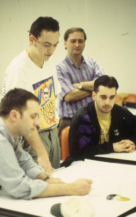 Photograph of students in the Graphic Arts program