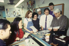 Photograph of faculty Ken Cummings in class with Industrial Design students