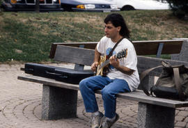 Photograph of a Music student practicing guitar