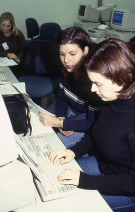 A photograph of students at work in a computer lab