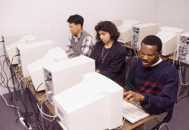 Photograph of students working in the computer lab
