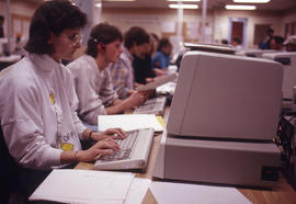 Photograph of students working on the computer