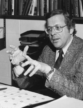 Photograph of Bob Caco Talking to Someone