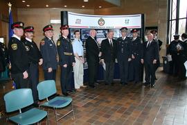 President John Davies with officials at RIDE program launch : [photograph]
