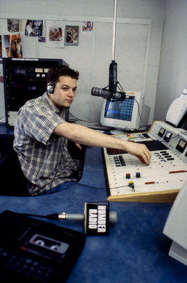 Photograph of student in Humber radio broadcasting studio