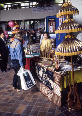 Photograph of booths at an international information event in E Building
