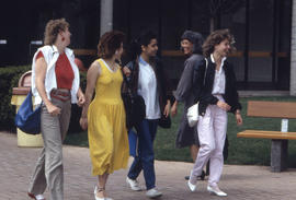 Photograph of students on the front walkway to IE building
