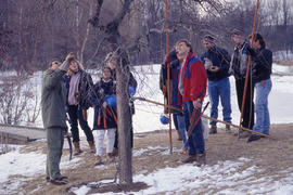 Photograph of a Landscaping instructor giving instructions on winter tree pruning to Arboretum vi...