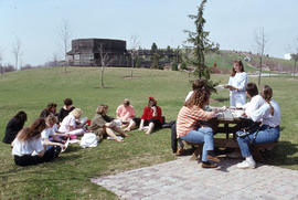 Photograph of a class held on the grounds of the Arboretum