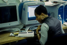 Photograph of student in journalism lab