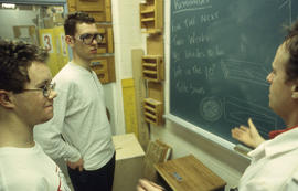 Photograph of Mark Paddison and students in the Cabinet Making / Woodworking program