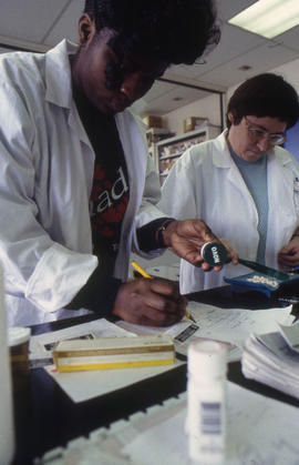 Photograph of Pharmacy Assistant students at work