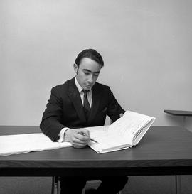 Photograph of Vincent Stabile studying